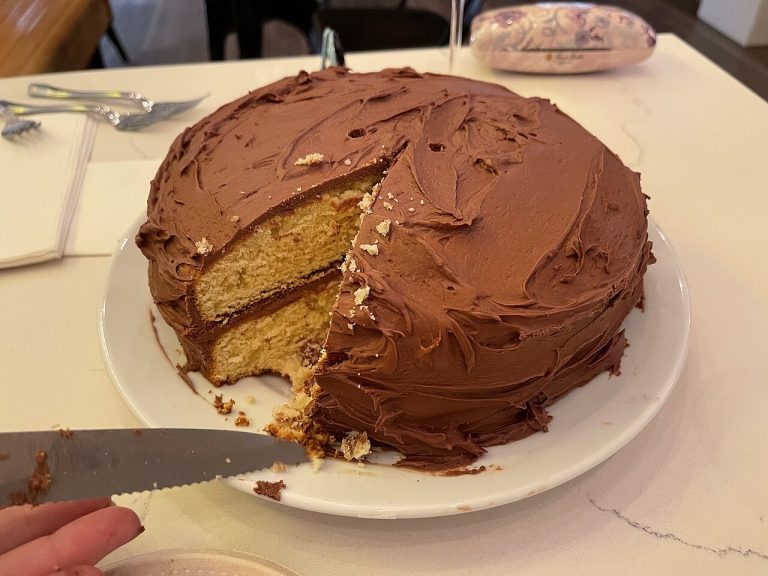 Homemade yellow cake with chocolate frosting