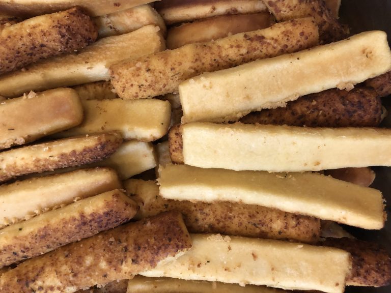 Garlic breadsticks with a lightly crisp exterior and soft center